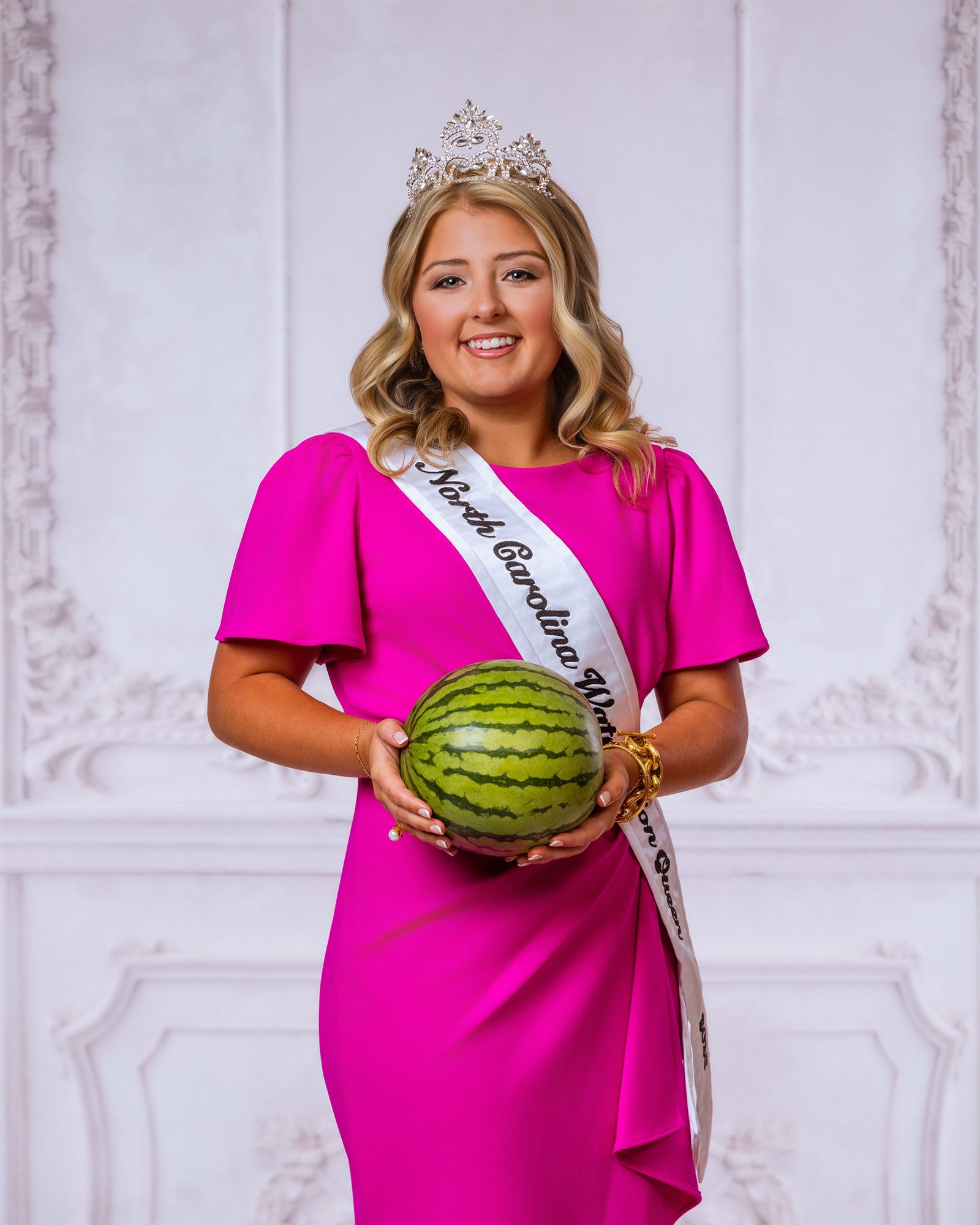 Lilah Byrum holding a whole North Carolina watermelon